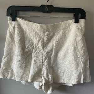 White sequin lace shorts
